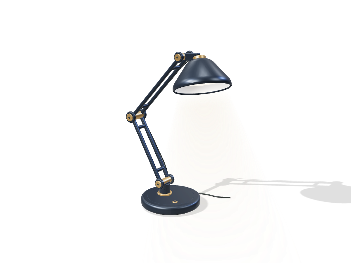 A graphite desk lamp with brass pivots and a warm light