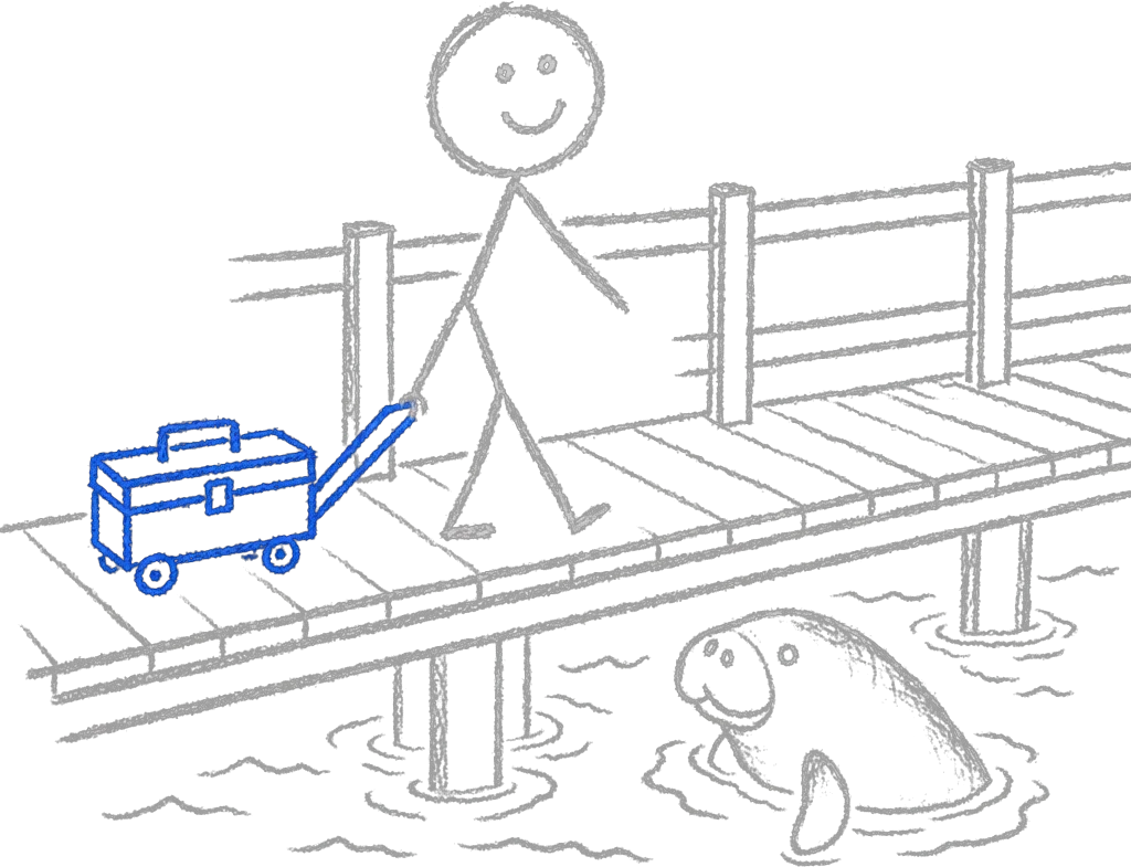 Stick figure on a riverside boardwalk pulling a small blue toolbox on wheels as a manatee surfaces near the dock pilings.